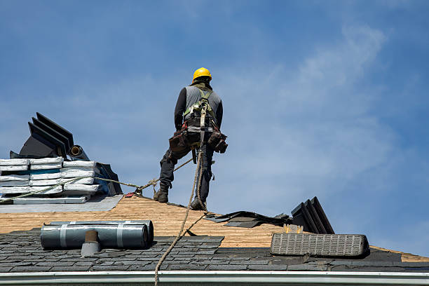 Professional Roof Replacement technician working in Ellington, MO